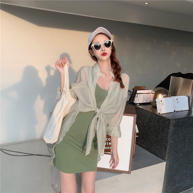 Áo khoác kết hợp với đầm body - Công ty đồng phục Action