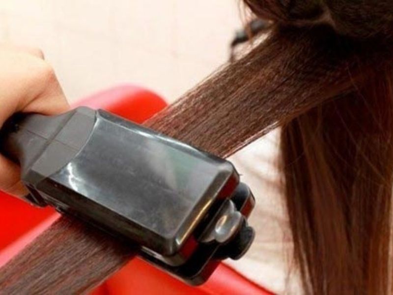 Máy kẹp nhiệt làm phồng chân tóc.