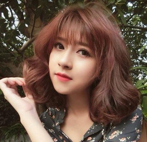 khuôn mặt dài hợp với kiểu tóc nào