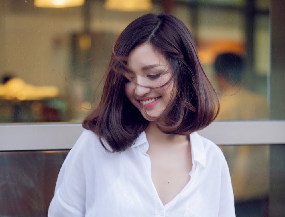 Kiểu tóc ngang vai uốn cụp cho người mặt dài đẹp nhất