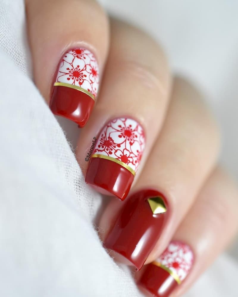 Mẫu nail vẽ hoa màu đỏ