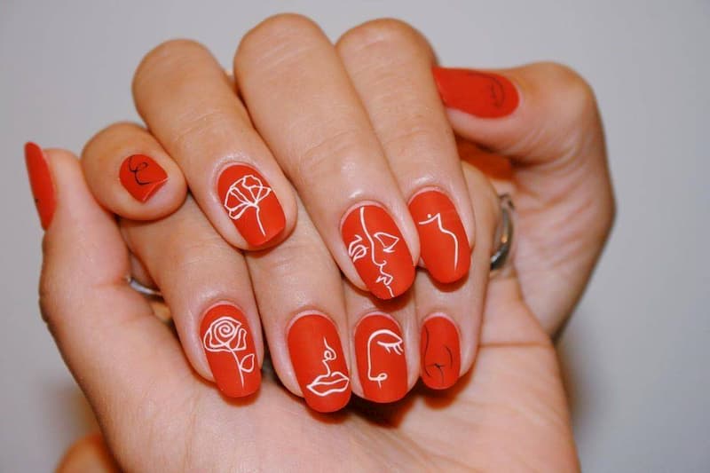 Mẫu nail màu đỏ vẽ hình dễ thương