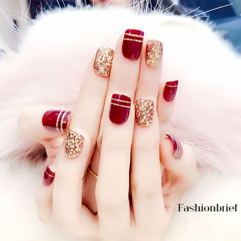 Mẫu nail màu đỏ đính kim tuyến